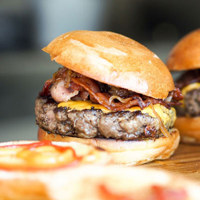 close-up of three burgers