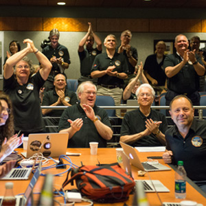 group of people celebrating.